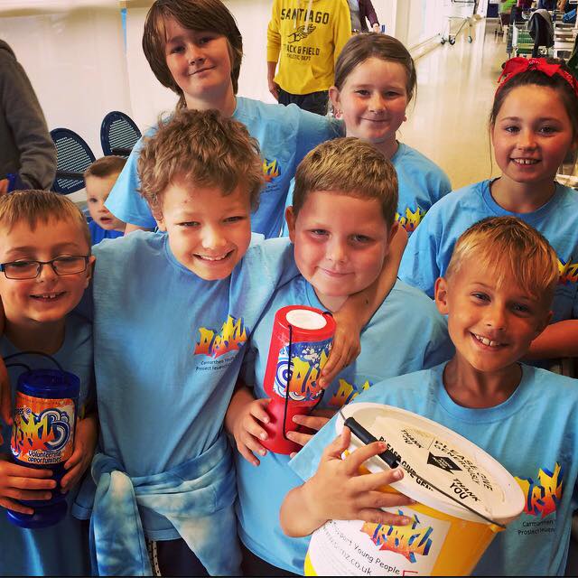 A group photo of children from the Carmarthen Youth Project